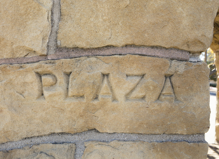 Detail photo of hand chiseled word in sandstoneの写真素材
