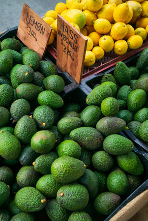 Lemons and avocados on sale at a farmers market in Santa Barbara, California