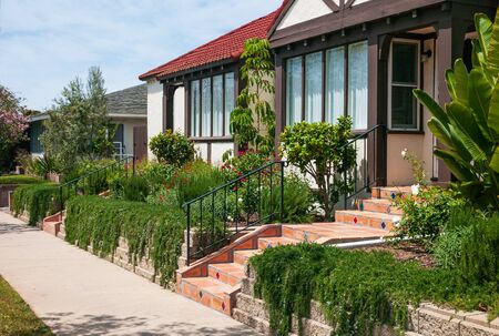 Southern California home landscape featuring a variety of plants that are drought-tolerant and beautifulの写真素材