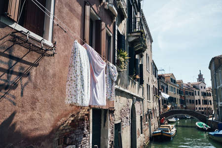 Colorful houses and buildings in Venice in daylight summer atmosphere, Italyの写真素材