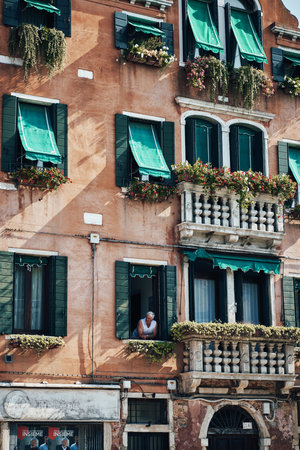 Bright colorful houses and buildings in Burano - streets of veniceの写真素材