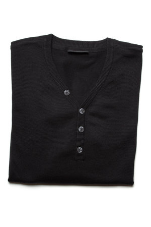 The image shows a black pullover over white backgroundの写真素材