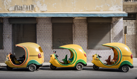 Small cuban coco taxis in lineの写真素材