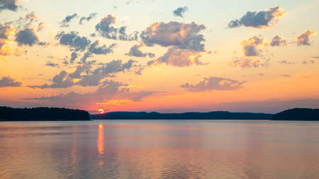 Beautiful sunrise over lake Ouachita near Hot Springs Arkansasの写真素材