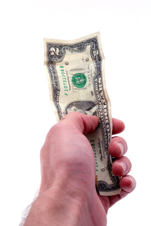 hand holding a two dollar bill