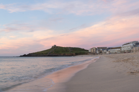 St Ives sunset at Porthmeor Beachの写真素材