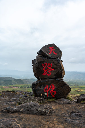 Chinese hieroglyphs on the rock at Phu Chi Fa, Vietnam