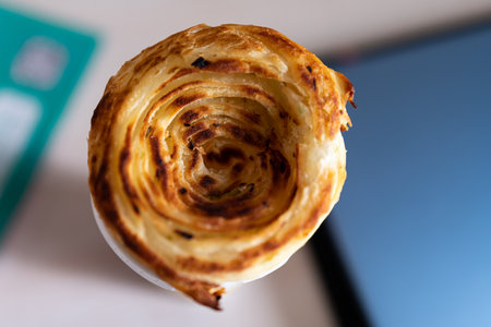 Puff pastry on a table in a cafe. Selective focus.の写真素材