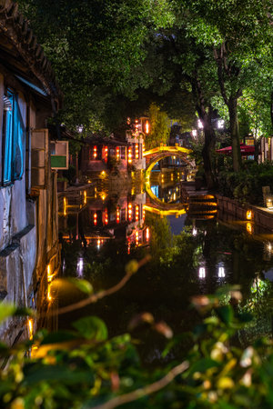 Night view of a canal in Suzhou, Jiangxi, Chinaの写真素材