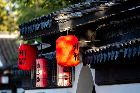Lanterns on the roof of an old Chinese house.の写真素材