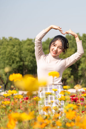 Beautiful asian woman in the flower garden, lifestyle people concept.のeditorial素材