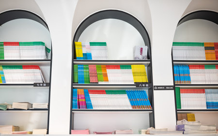 Bookshelf with books in modern library. Education and learning conceptの写真素材