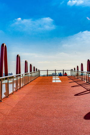 Pedestrian bridge over the sea in the evening, Thailand.の写真素材