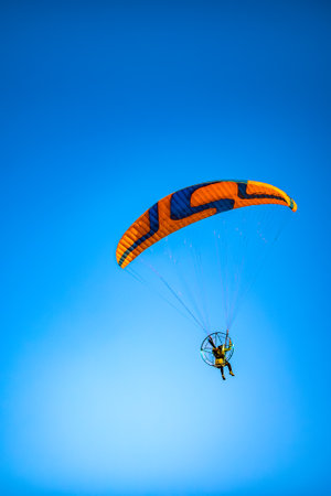 Paraglider in the blue sky. Paraglider in the blue sky.の写真素材