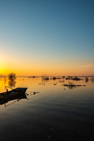 Beautiful sunset on the lake in the evening. Landscape.の写真素材
