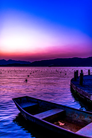 Beautiful sunset on a lake. The lake is the largest in the region.の写真素材