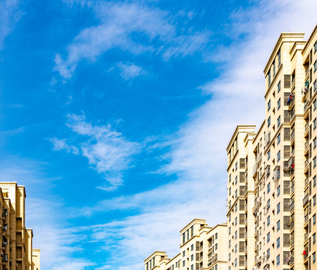 Modern apartment buildings on a background of blue sky in Moscow, Russiaの写真素材