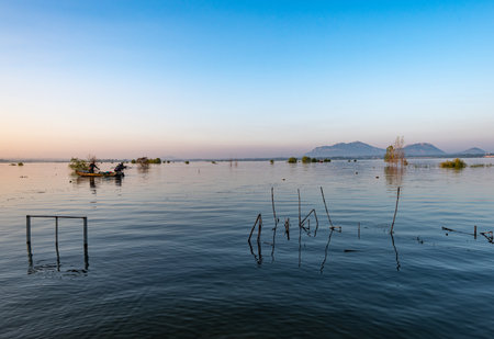 Fishermen in the lake of Kwan Phayao, Thailand.の写真素材