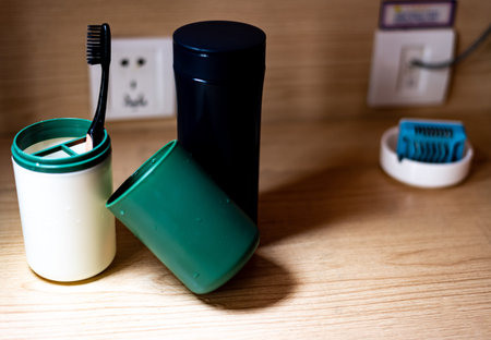 Toothbrush and toothpaste on a wooden table. Selective focus.の写真素材