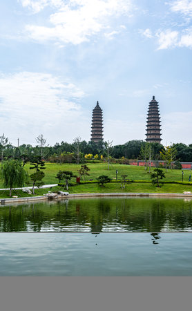 The twin pagodas at the lake in Ho Chi Minh city, Vietnamの写真素材