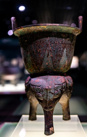 Chinese ancient bronze pottery in the museum, closeup of photoの写真素材