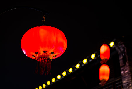 Red Chinese lanterns at night in the city, china.の写真素材
