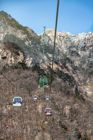 Cable car on the top of the mountain in winter season.の写真素材
