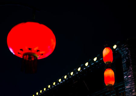 Red Chinese lanterns in the night, closeup of photo.の写真素材