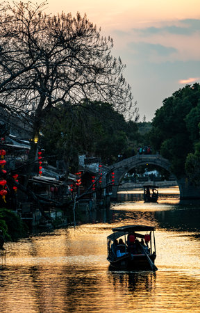 Unidentified people visit the ancient town of Suzhou at sunset. Suzhou is a UNESCO World Heritage Site.の写真素材