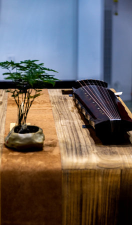 Musical instruments on a wooden table in a concert hall or chapelの写真素材