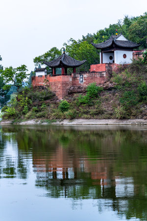 Landscape view of a temple by the river.の写真素材