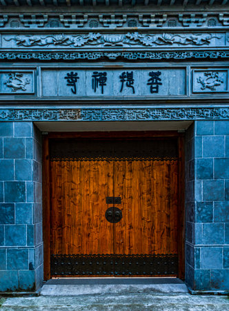 Wooden door in a chinese temple, closeup of photoの写真素材