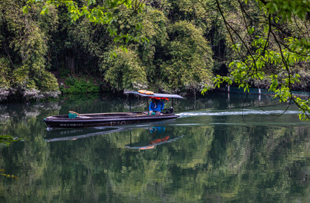 Fisherman boat on the river at Khao Sok National Park, Thailand