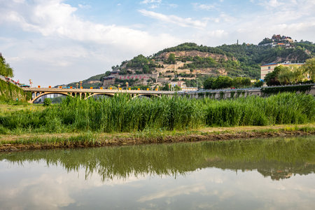 Mountain landscape with a river and a bridge in Beijing, Chinaの写真素材
