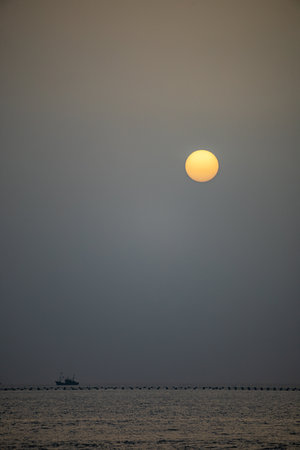 Sunset over the sea in the evening.の写真素材