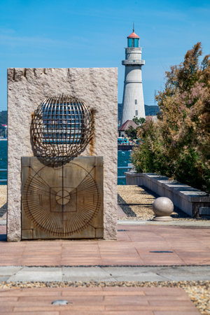 Lighthouse and sculpture on the promenade of the port of Sochi, Russiaのeditorial素材
