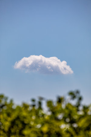 White cloud in the blue sky with copy space for your text.の写真素材