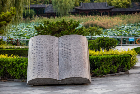 Stone book in the garden of chinese temple,Thailand.の写真素材