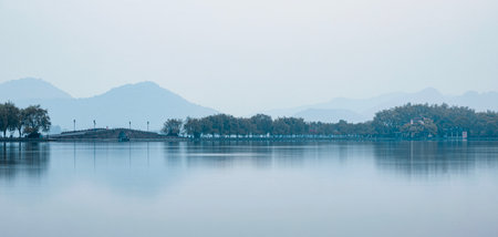Landscape view of the lake and mountains in Hangzhou, Chinaの写真素材