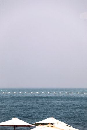 view of the sea from a ship, in the background a blue skyの写真素材