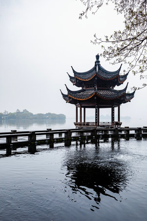 Pavilion on the lake in Hangzhou, China. Hangzhou is a popular tourist destination in China.の写真素材