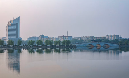 Sunset scenery of a lake in the city of Beijing, Chinaの写真素材