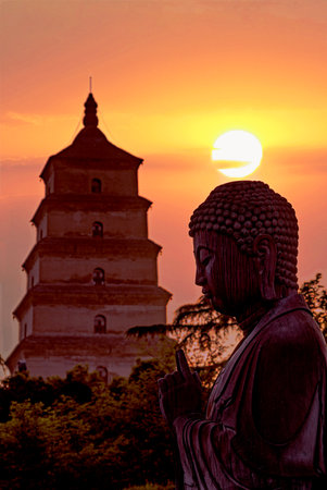 Sunset at the pagoda in China.の写真素材