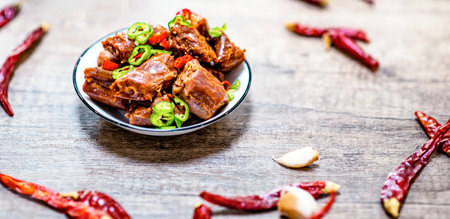 Thai food, Spicy pork spareribs on wooden backgroundの写真素材