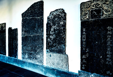 Ancient Chinese hieroglyphs in a temple, closeup of photo