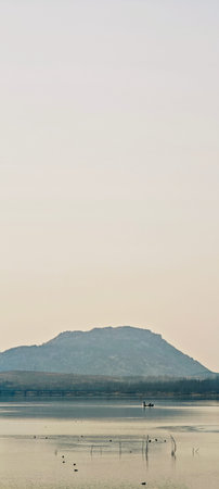 Landscape view of the lake and mountains in the morning, Thailand.