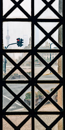 View of the city of Berlin through the window of a latticeのeditorial素材