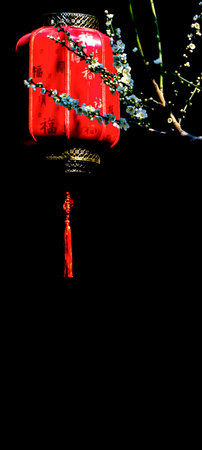 Red lantern on black background, chinese new year celebration concept.の写真素材