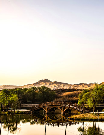 Beautiful landscape of sand dunes and bridge at sunset, Thailand.の写真素材