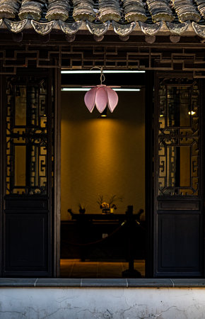 Chinese traditional style window with lamp in the old city of China.のeditorial素材